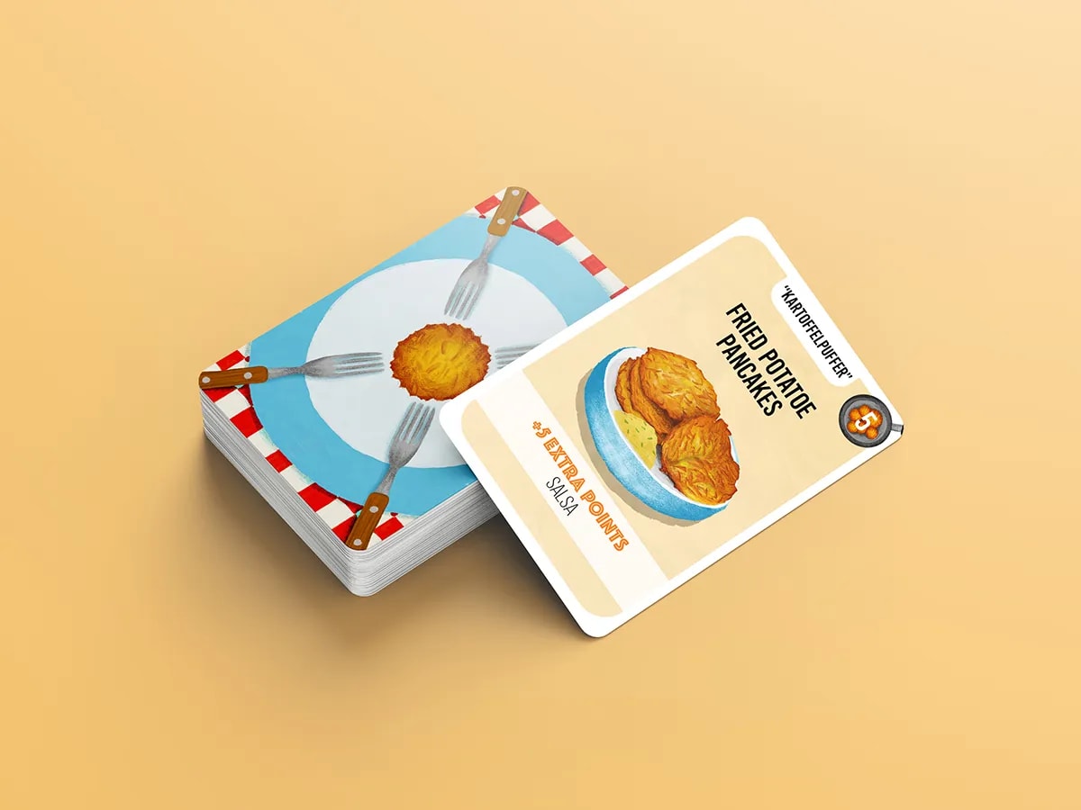 Baraja de cartas ilustradas de comida con tortitas de patata Kartoffelpuffer, de Adriana Valdez, alumna de Ilustración y Animación 2D en TRAZOS