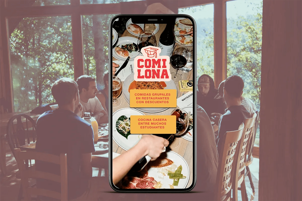 Mockup en móvil de la pantalla de inicio de la app COMILONA con comidas grupales y cocina casera para estudiantes, de Sofía Villalta, alumna de UX/UI/Web en TRAZOS