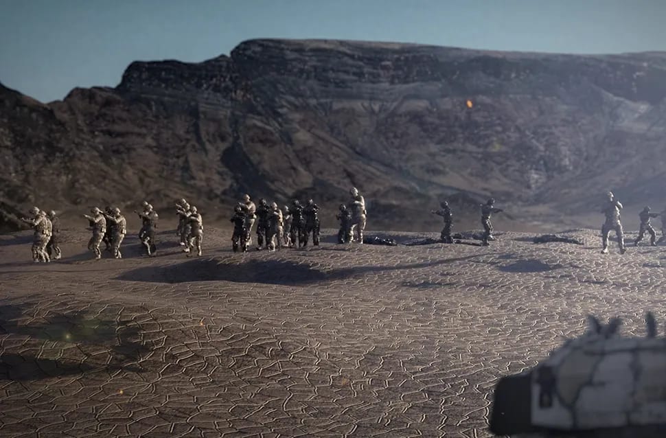 Plano de efectos visuales con un grupo de soldados en un desierto montañoso, módulo de la Doble Carrera en Postproducción de TRAZOS, escuela de arte digital en Madrid
