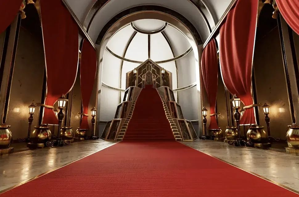 Interior teatral modelado en 3ds Max, con alfombra roja, escalinata, cortinas y lámparas doradas, módulo de la Carrera en Videojuegos de TRAZOS, escuela de arte digital en Madrid