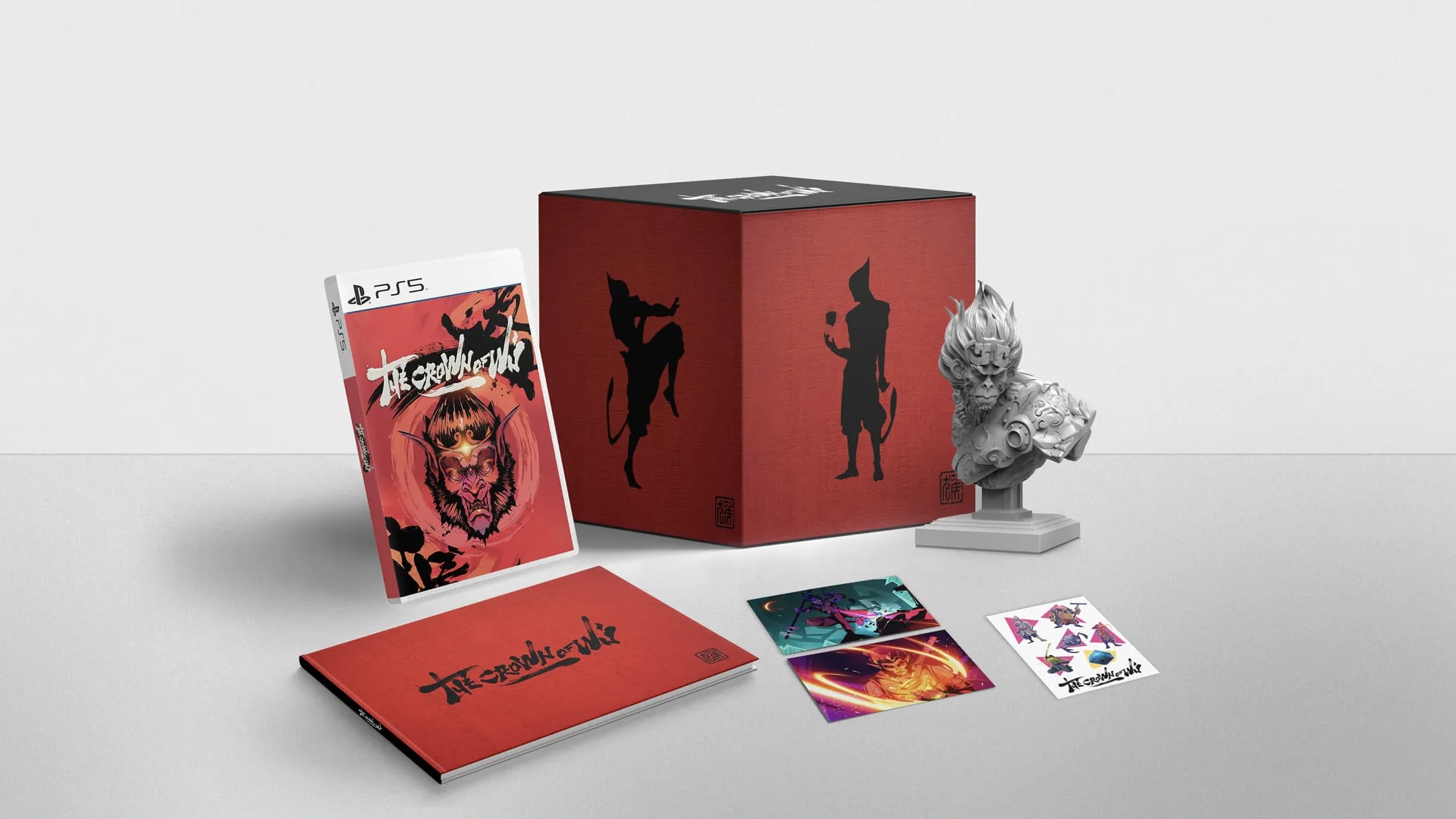 Diseño del packaging de la edición coleccionista del videojuego The Crown of Wu para PS5, con caja roja, artbook y figura, trabajo de Iván Carnero, profesor de Diseño Gráfico de TRAZOS, escuela de arte digital en Madrid