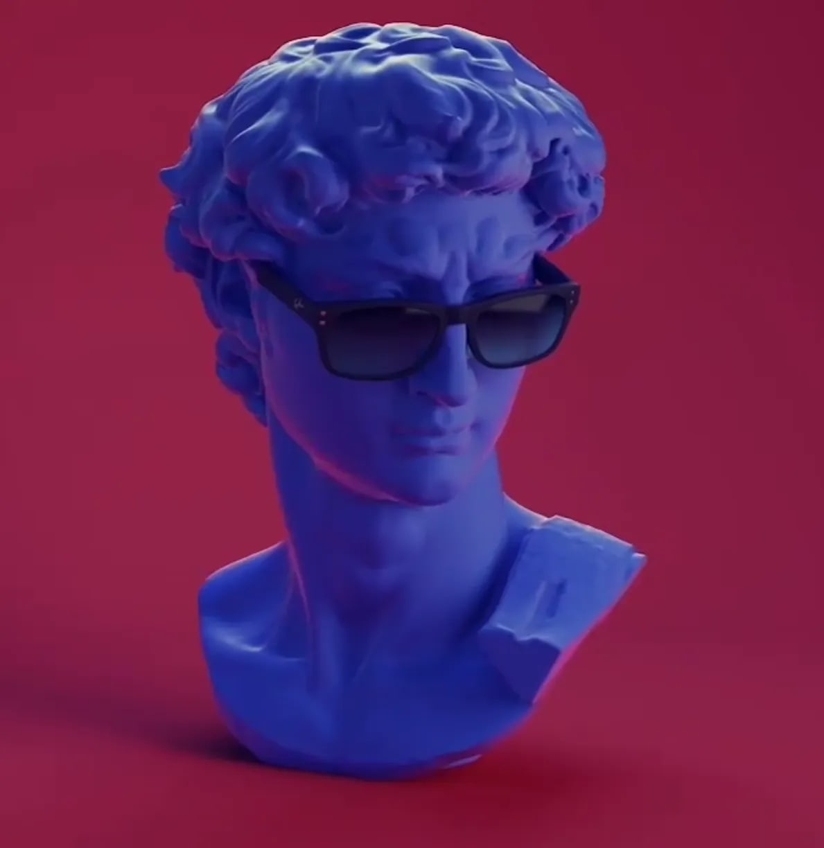 Render 3D del busto azul de David con gafas de sol sobre fondo rojo en estilo vaporwave, trabajo de Jorge Asso, profesor de Motion Graphics de TRAZOS, escuela de arte digital en Madrid