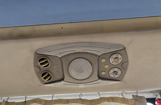 45 seater coach amenities — cup holder and cabin feature