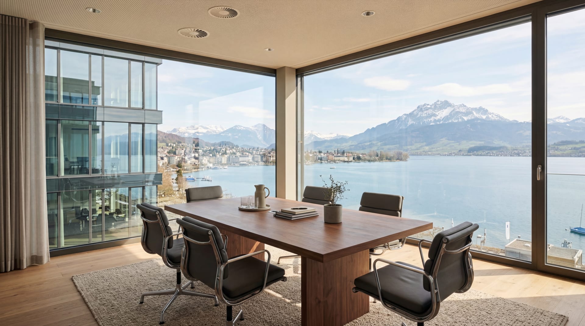 Modern office in Zug Switzerland with lake and mountain views