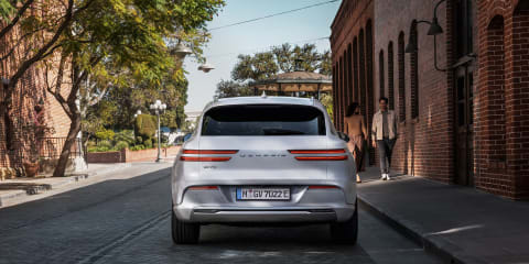 gme-ls-eGV70-silver-exterior-still-people-outdoor-city-back-02-24_L-16_9