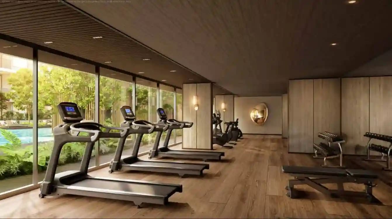 Origin Place Bang Tao — fully equipped fitness centre with treadmills overlooking the pool