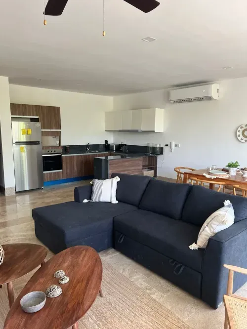 The City Playa modern 1BR interior with open-plan kitchen