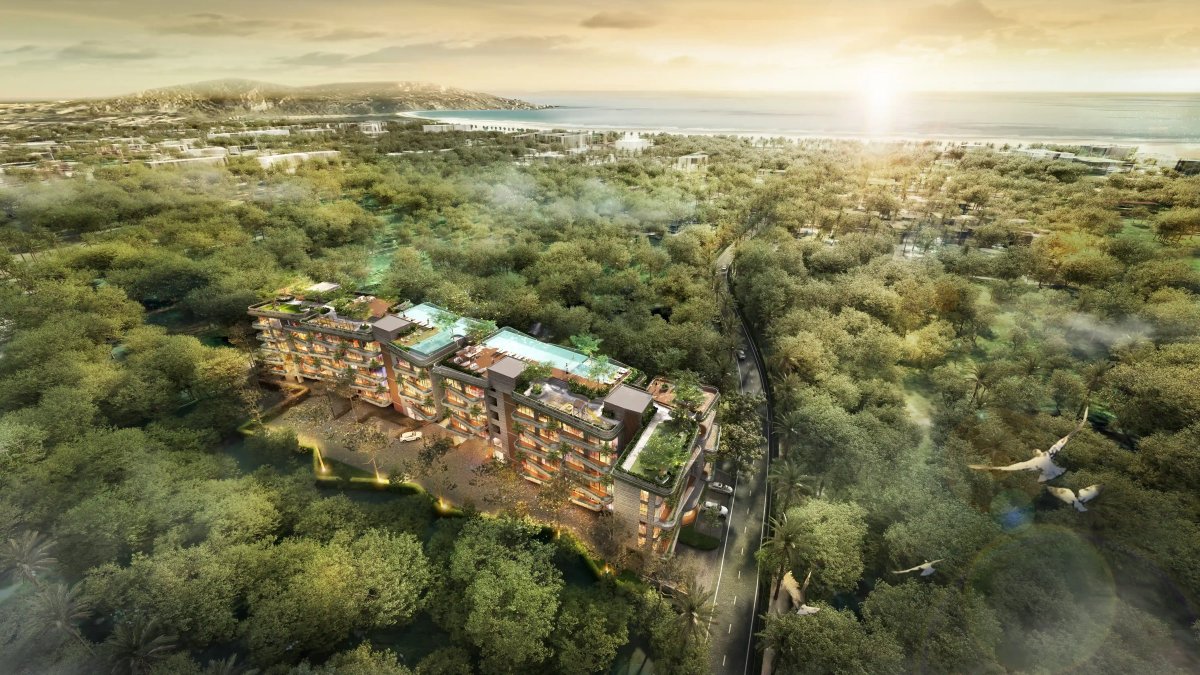 Cascade Bangtao Beach exterior, low-rise building set in tropical landscape