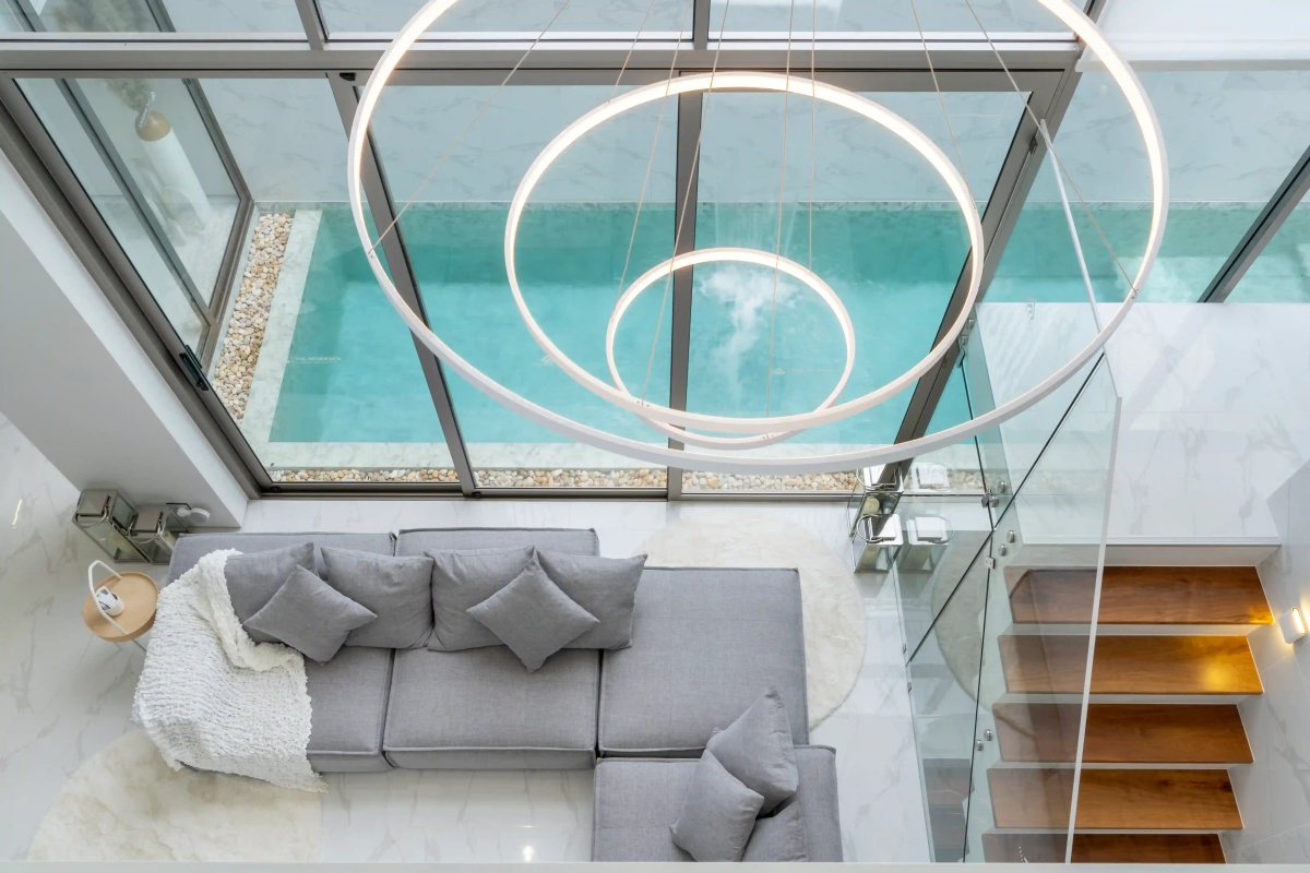The Residence Prime master bedroom interior, premium finishes and natural light in four-bedroom villa