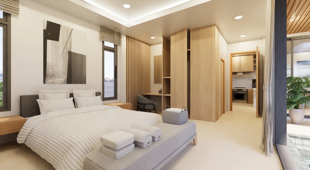Interior living space at Le Villa Lake, natural stone, timber and garden connection