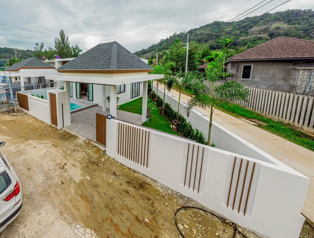 Narinsaya Pool Villas exterior with garden landscaping and entry