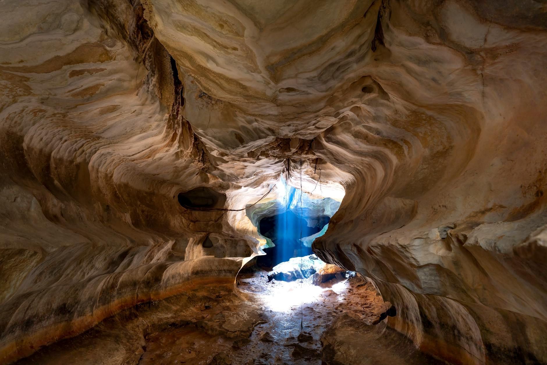 Natural beauty of a cave in Kien Giang, Vietnam, with sunlight streaming through.