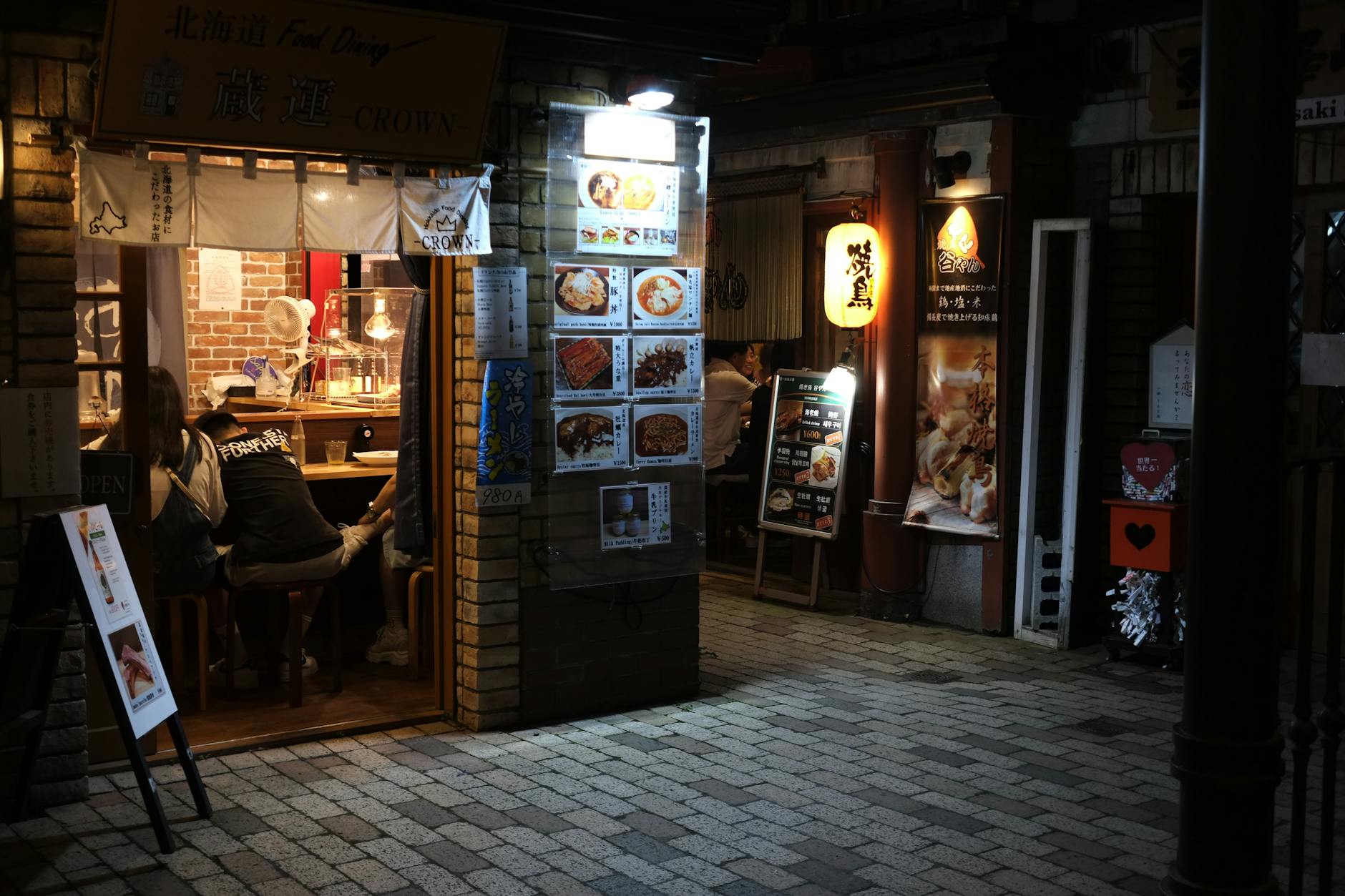 Charming Asian street food restaurant with warm lighting and traditional decor