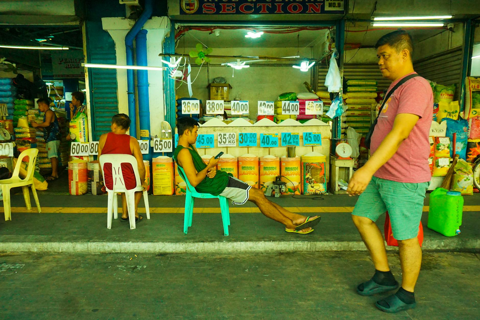 Candid street photography captures vibrant daily life in a Pasig City wet market.