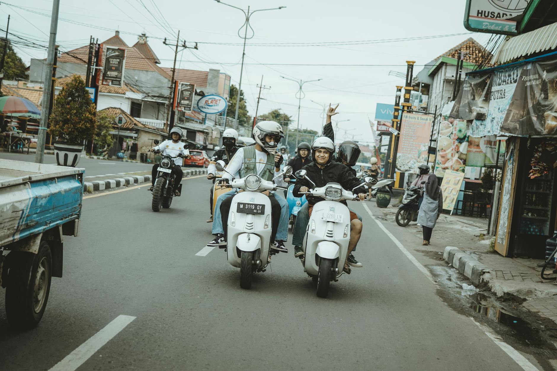 A group of friends enjoying a fun motorcycle ride in East Java, Indonesia.