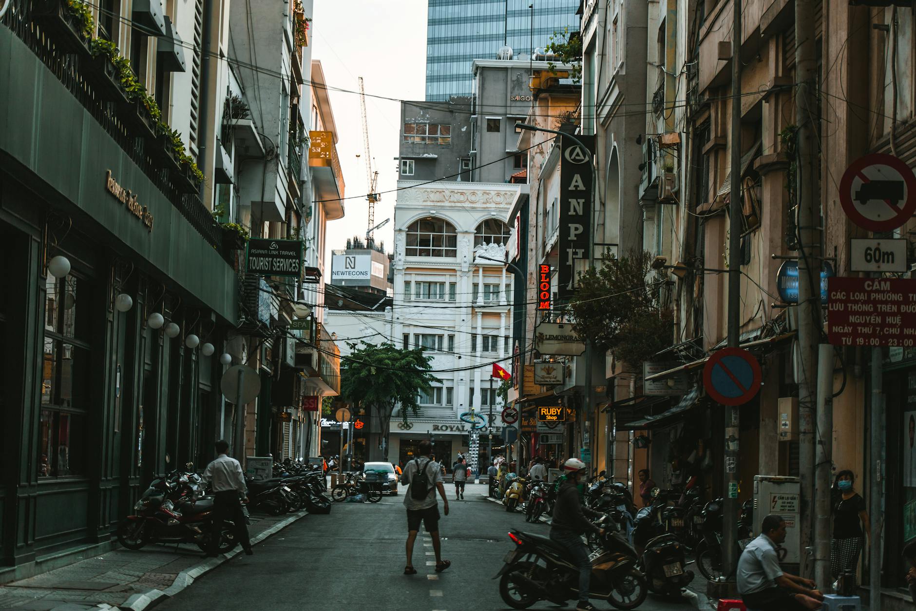 Vibrant street scene in Hồ Chí Minh City, featuring bustling life and unique architecture.