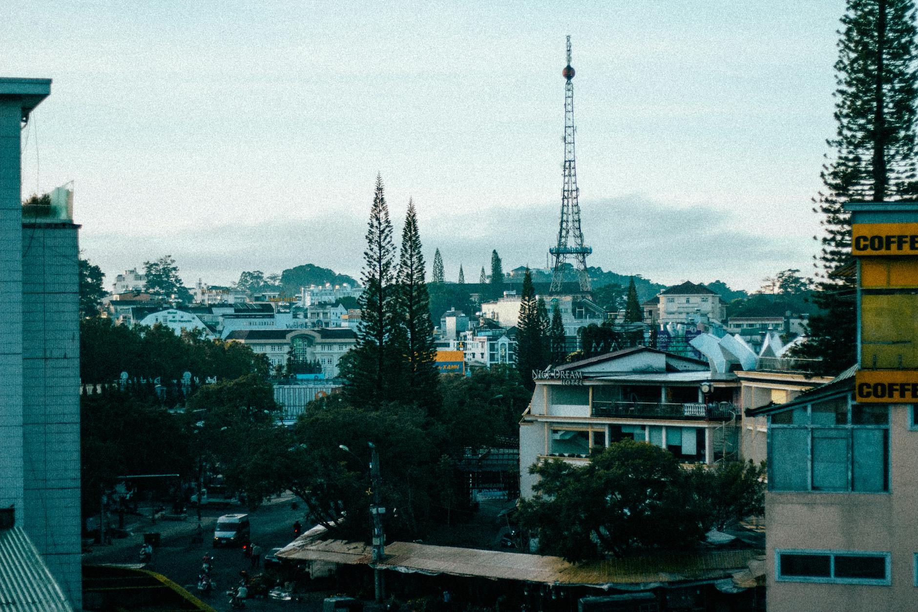 Panoramic view of Dalat, Vietnam featuring the iconic TV tower and lush surroundings.