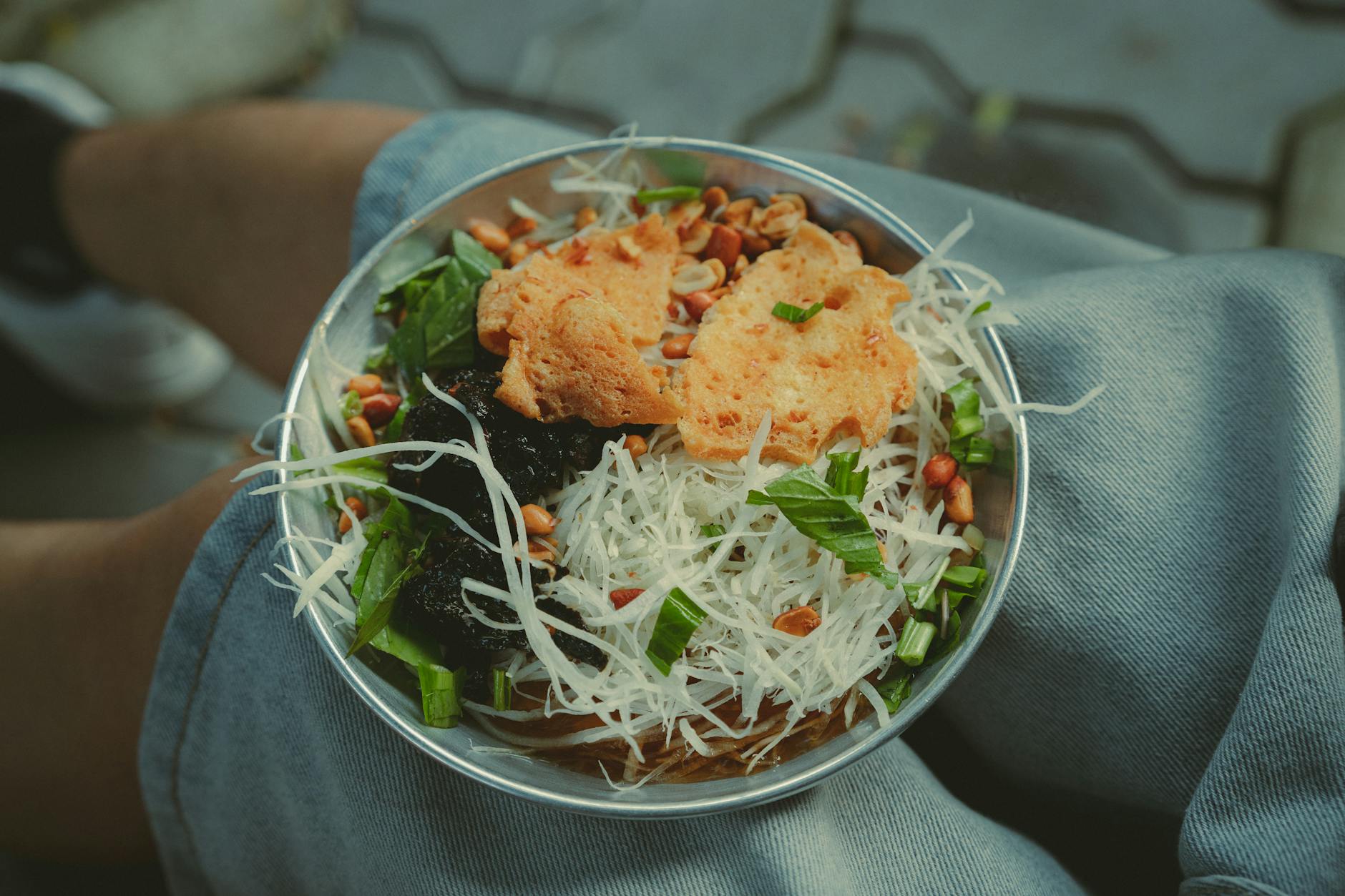 A vibrant Vietnamese salad featuring fresh ingredients captured in Ho Chi Minh City.