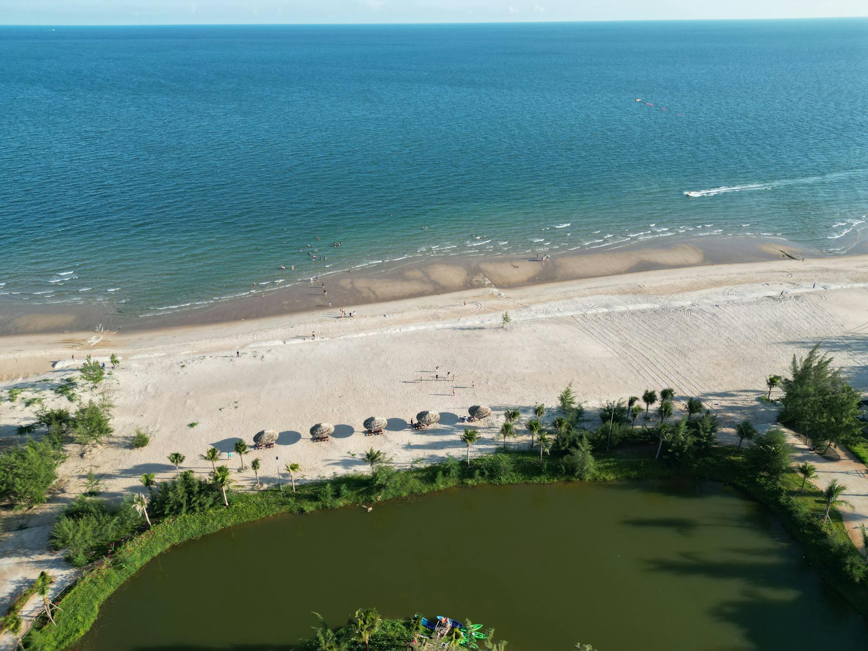 Stunning aerial view of Hồ Tràm Beach with blue ocean and sandy shores in Vietnam.
