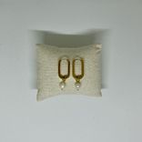 Witte oorbellen - Image 1