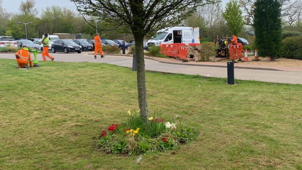 Horizontal directional drilling crew working on the grounds at The Hospice of St Francis in Berkhamsted, Hertfordshire.