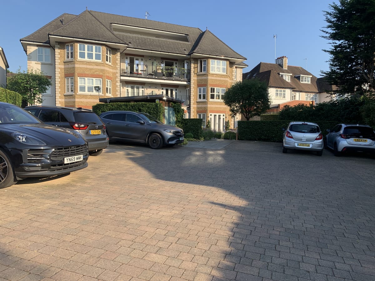 Ashby Lodge residential apartment block with block paved car park in Hendon, London