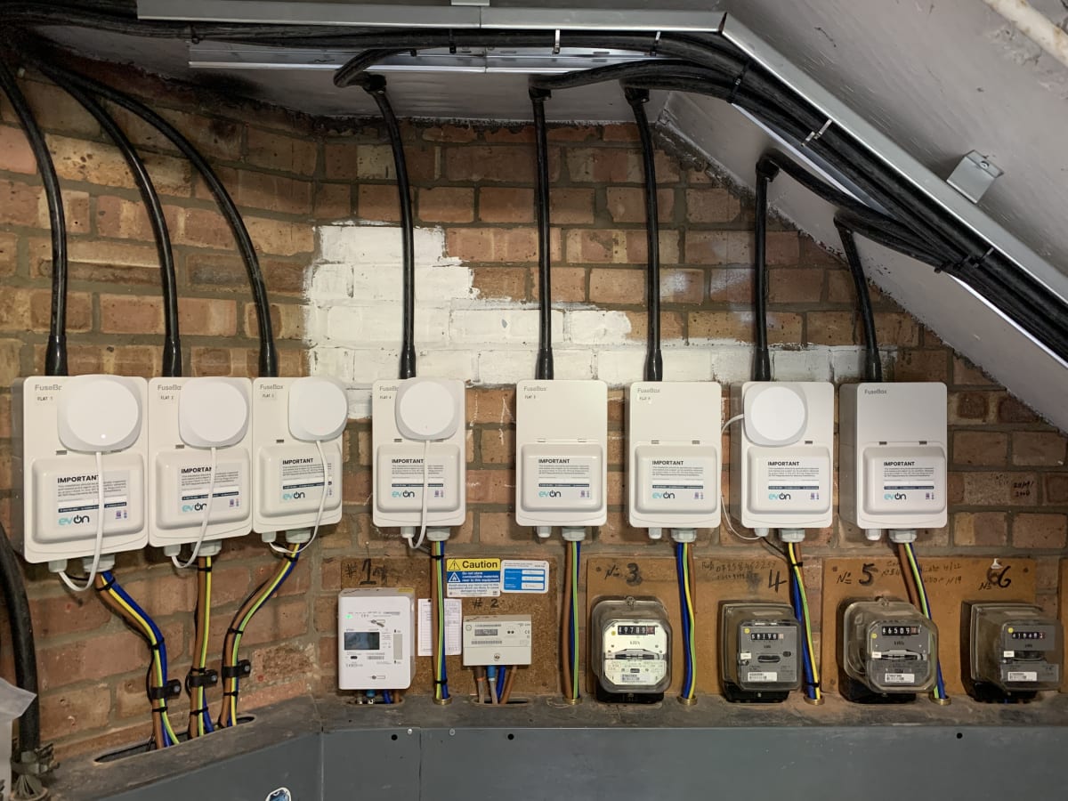 Close-up of eight EV-ON sub-distribution boards with Easee Equalizer load balancing devices for individual metering at Hill Court