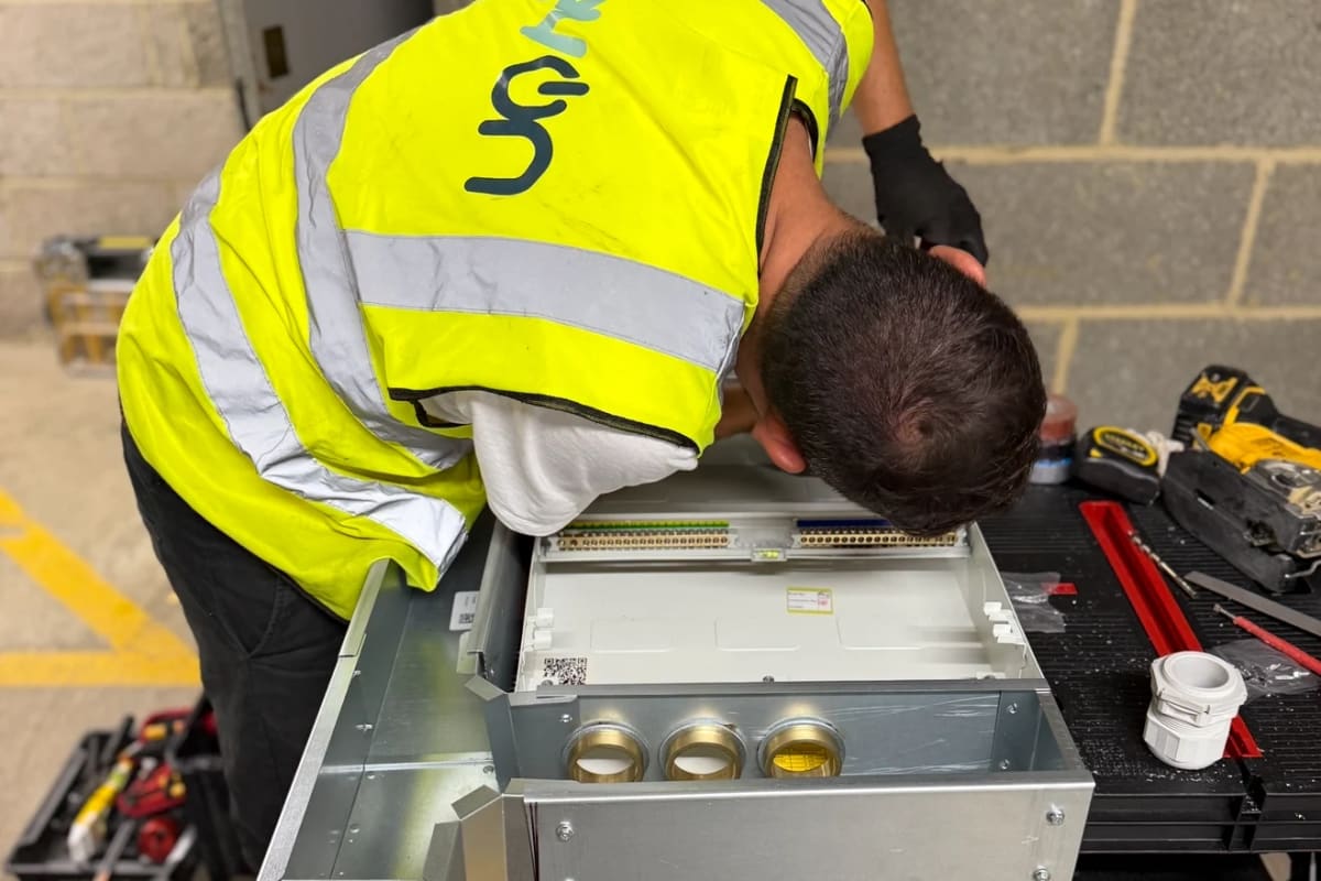 EV-ON technician terminating EV distribution board for load management upgrade