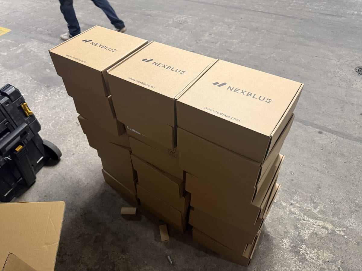 24 Nexblue Point 2 7kW chargers stacked and ready for installation at The Avenue apartment block, Kilburn.