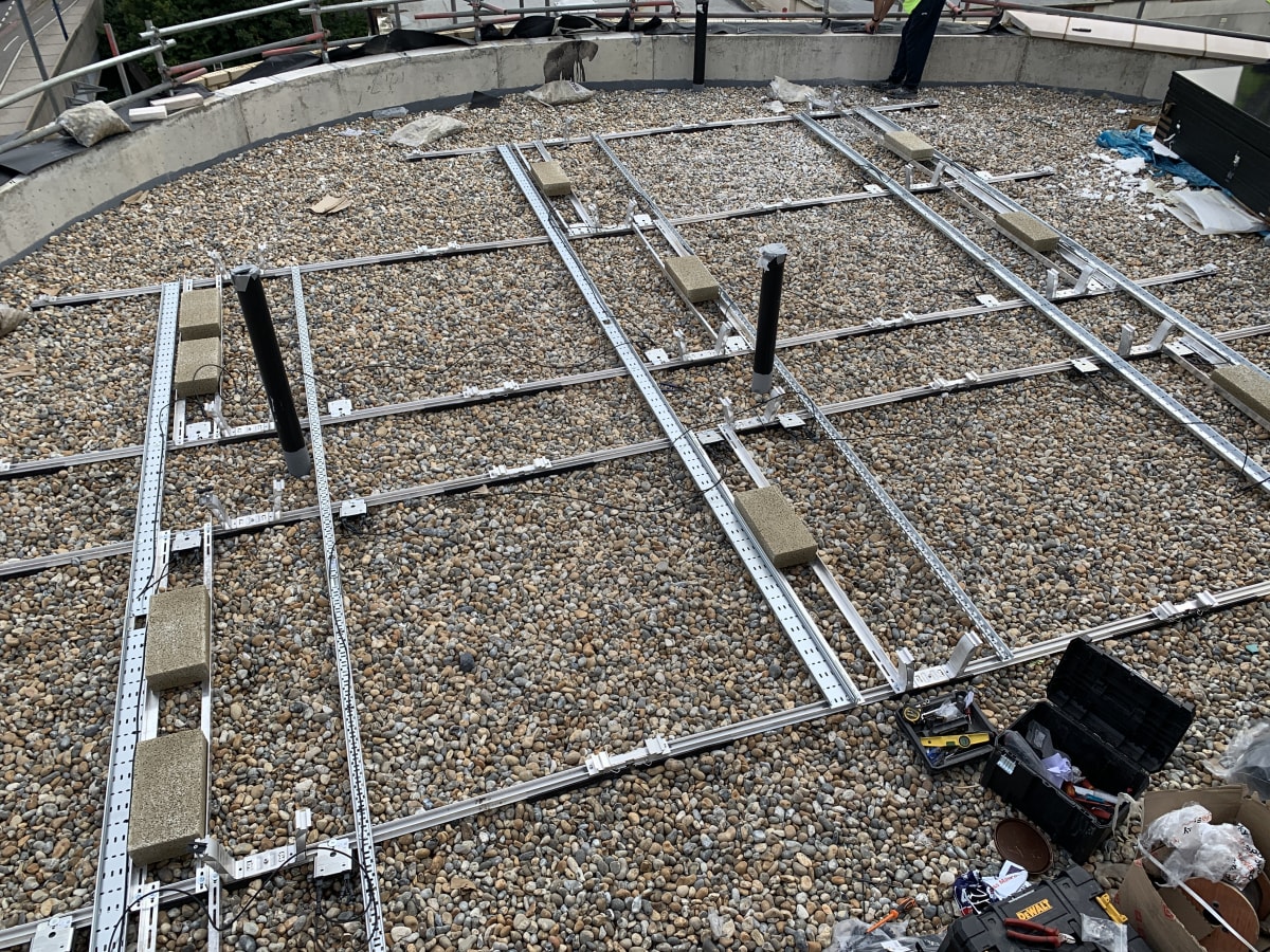 Completed K2 mounting frame on the flat roof at The Mirador, Acton, ready to receive 18 Jinko Tiger Neo panels.
