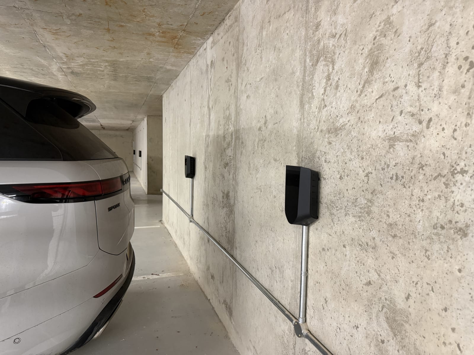 Easee EV chargers installed in the apartment car park at Lincoln Court, Weybridge