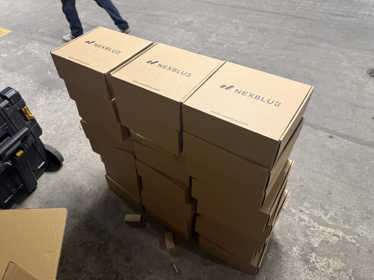 24 Nexblue Point 2 7kW chargers stacked and ready for installation at The Avenue apartment block, Kilburn.