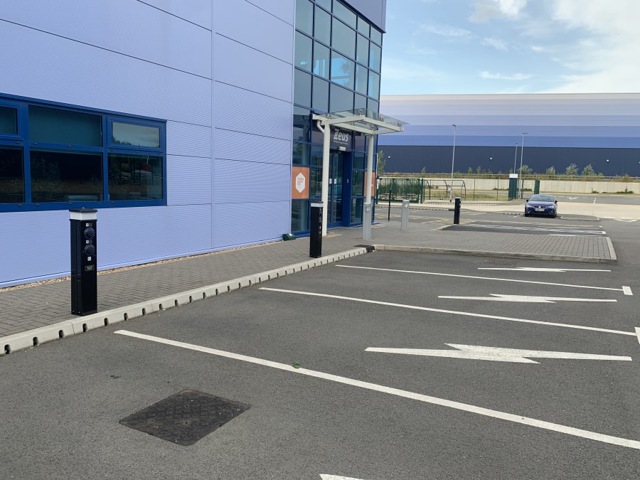 Zeus Packaging EV charger pedestals at entrance, Biggleswade