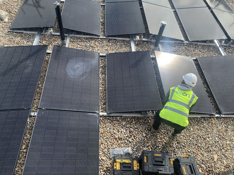 The Mirador apartment block with east west split rooftop solar array, Acton