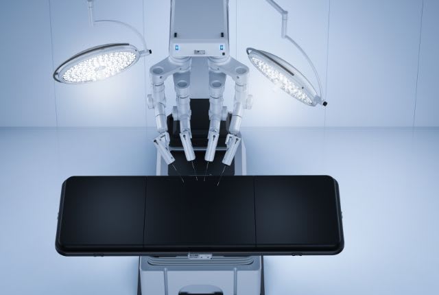 Opération du pancréas par robot à Valenciennes. Image d'un robot dans une salle d'opération.