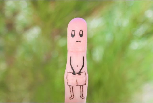 Phimosis : image d'un doigt sur lequel est dessiné un petit bonhomme mécontent.