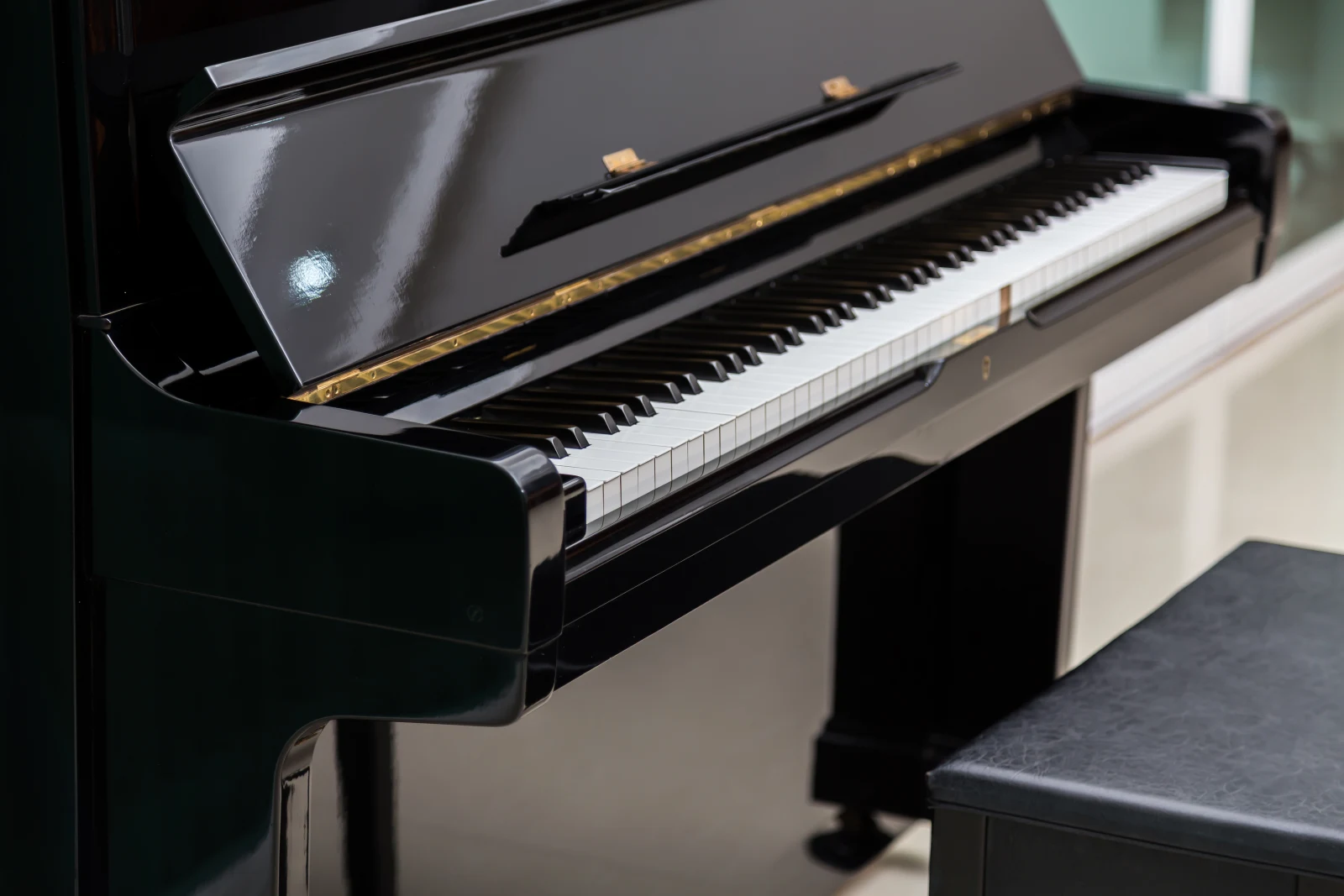 Grand piano being prepared for a move by Crystal Movers