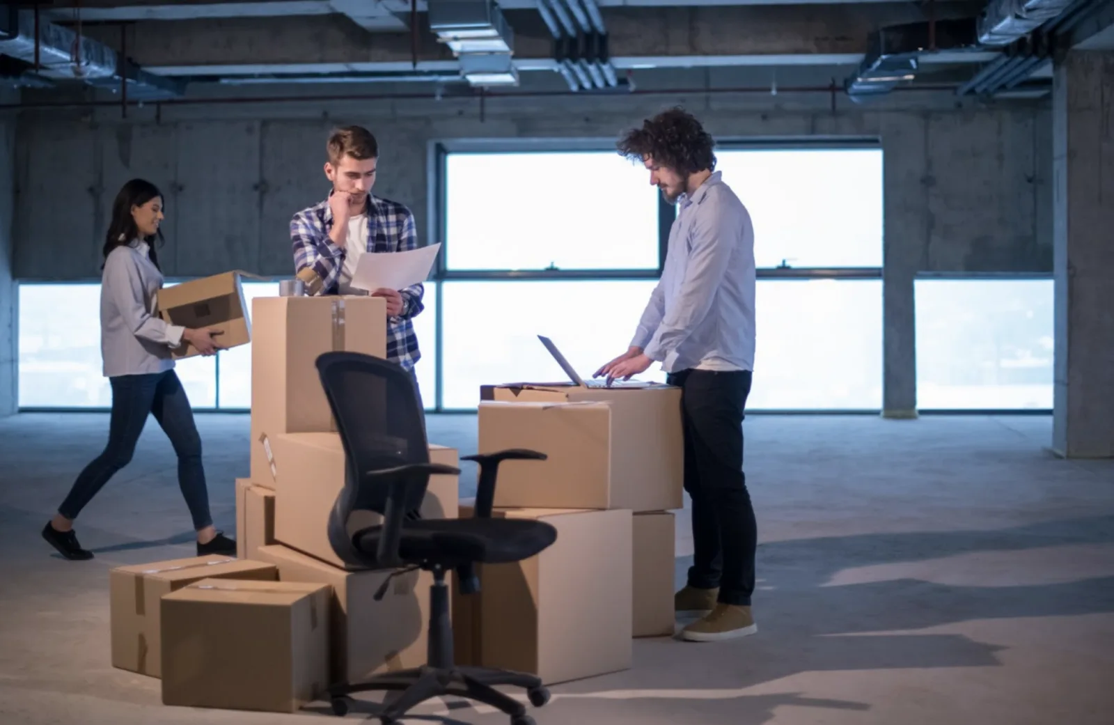 Crystal Movers team relocating office furniture and equipment in Melbourne