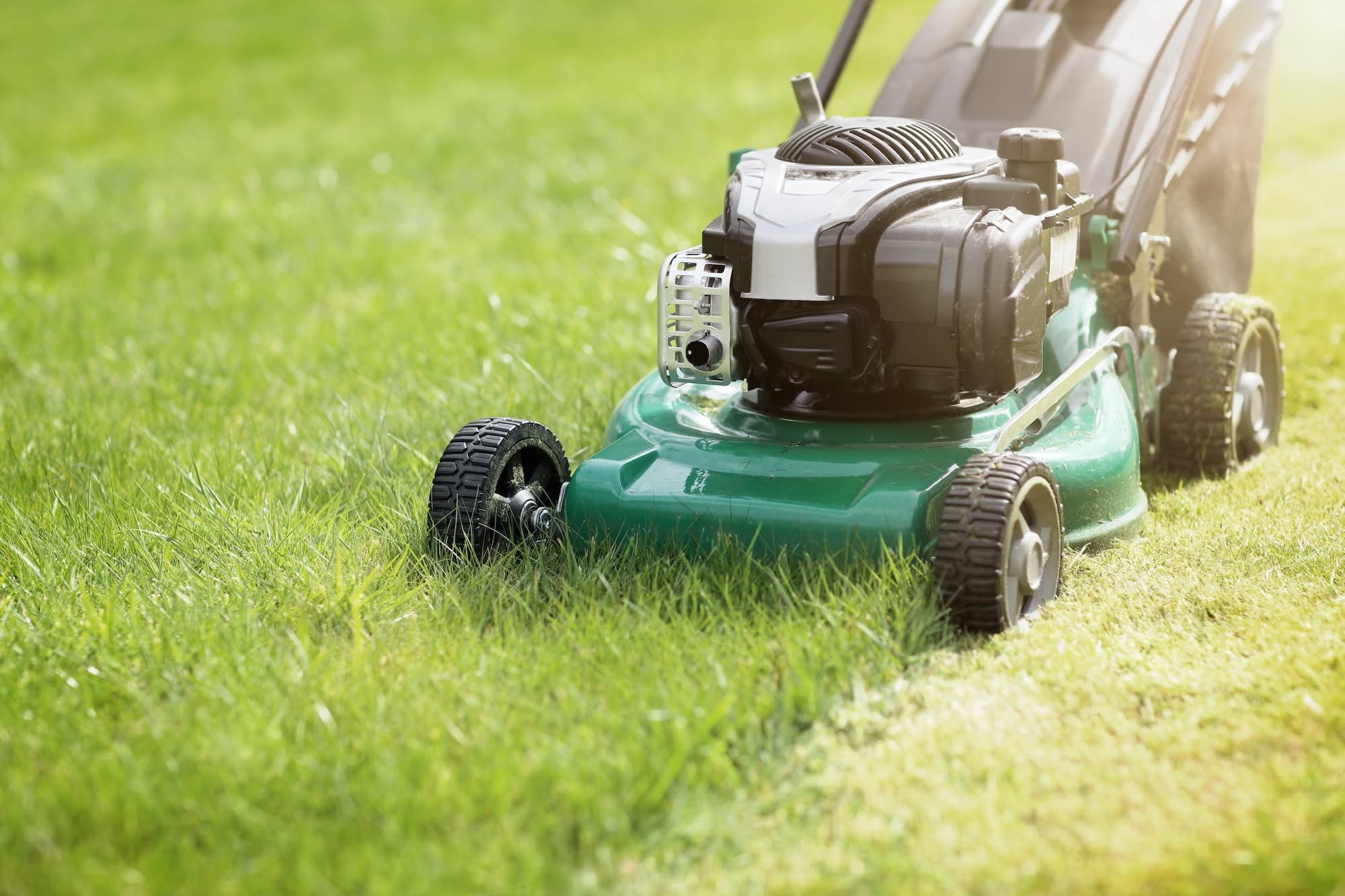Get Your Home Ready for the New Season with Spring Cleanup in Calgary 2 Mowing the grass