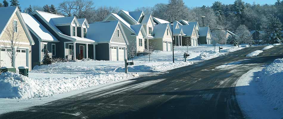 Keep Your Home Safe and Snow-Free: Residential Snow Removal in Auburn Bay, Alberta, Canada 3 content row of houses with plowed driveways