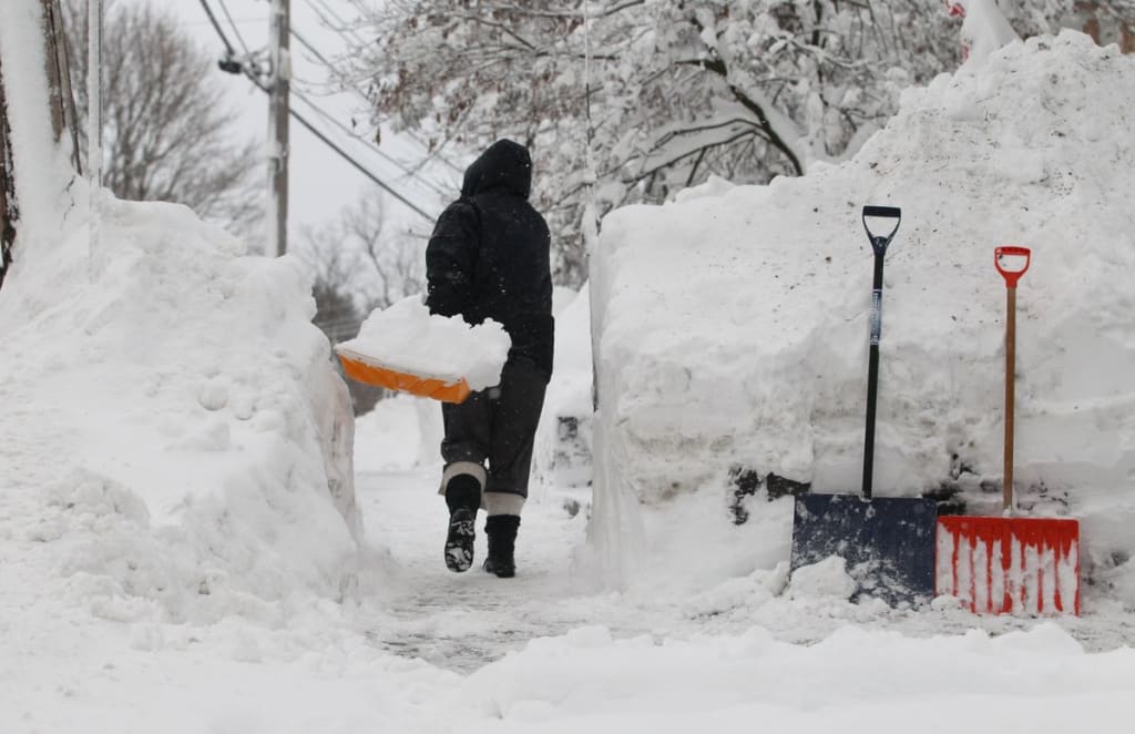 Ultimate Guide to Snow Removal in Alberta, Canada: Tips and Best Practices 2 payton digs out her car