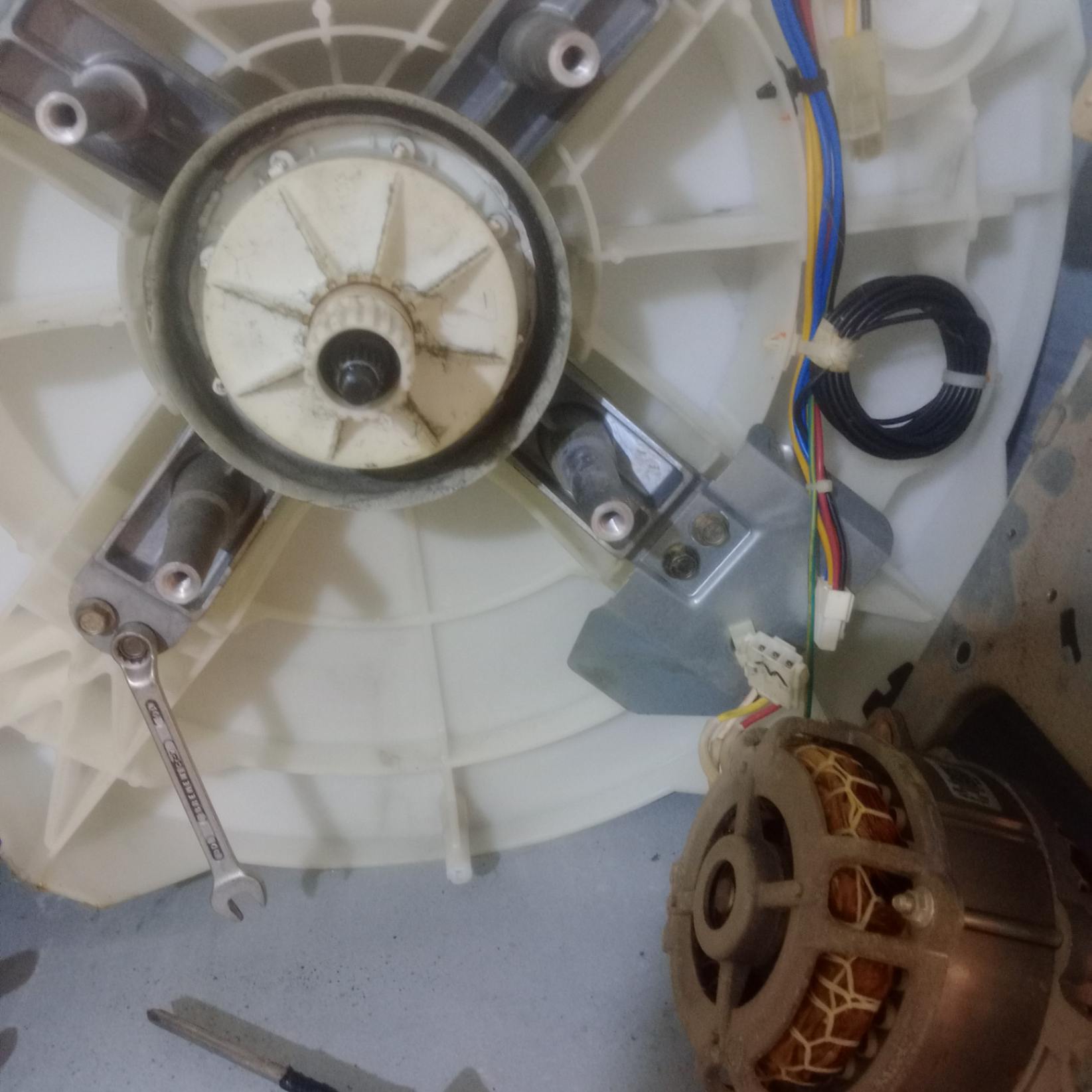 Cambio de caja de transmisión de lavarropas de carga superior