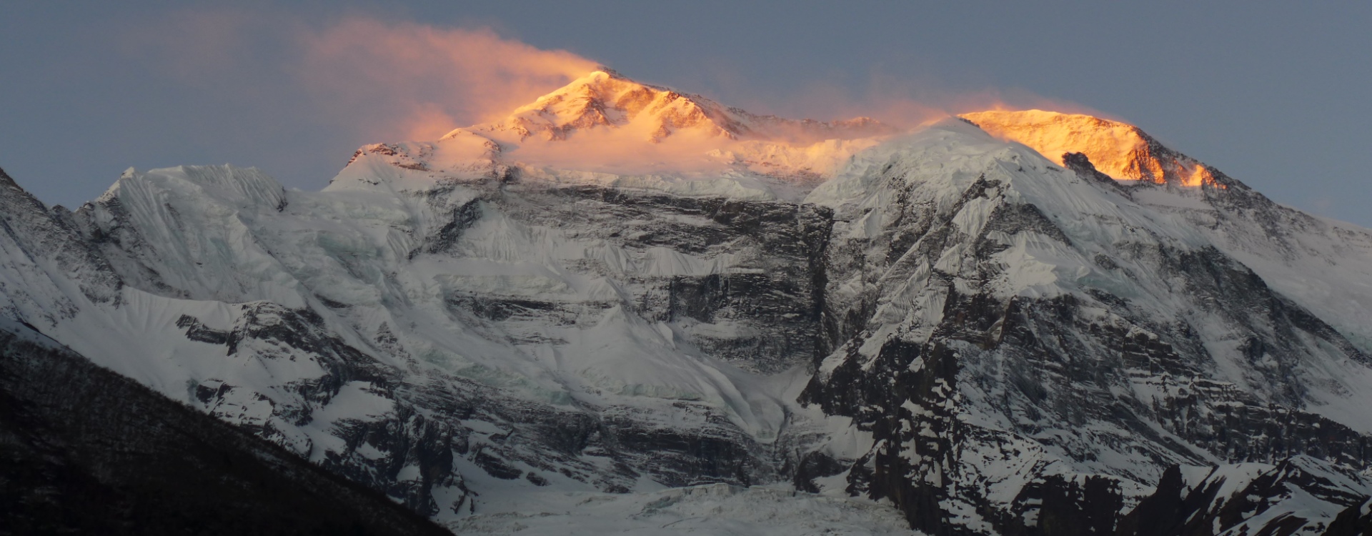 Himalayan sunrise, non-identifiable landscape Sunrise over the Himalayan mountain range, a tribute to fallen climbers