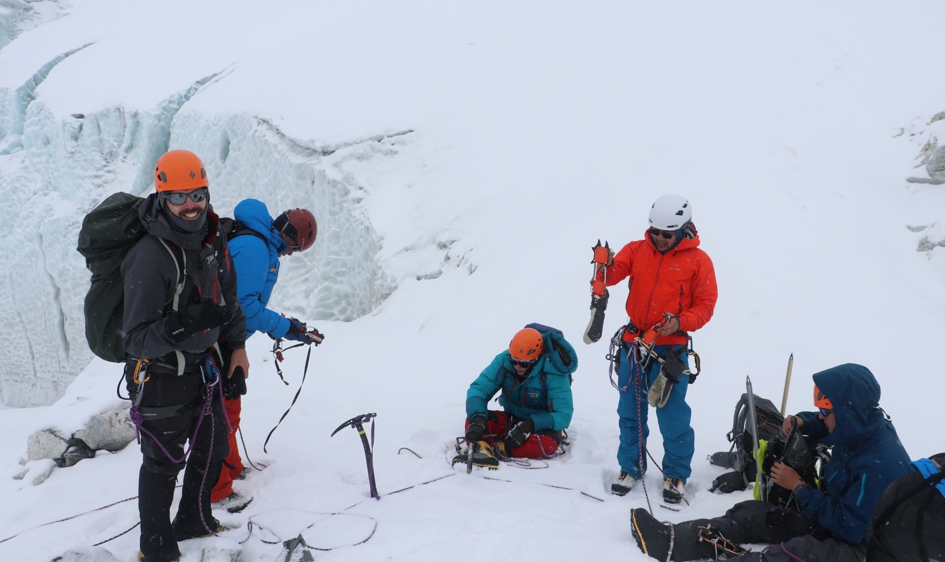 Island Peak Crampon Point at High Altitude Climber fitting crampons at the Island Peak crampon point