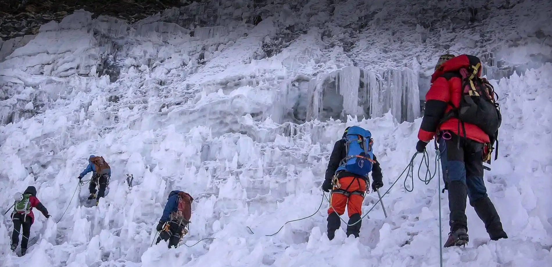 Island Peak Glacier Traverse Roped climbing team crossing the Island Peak glacier