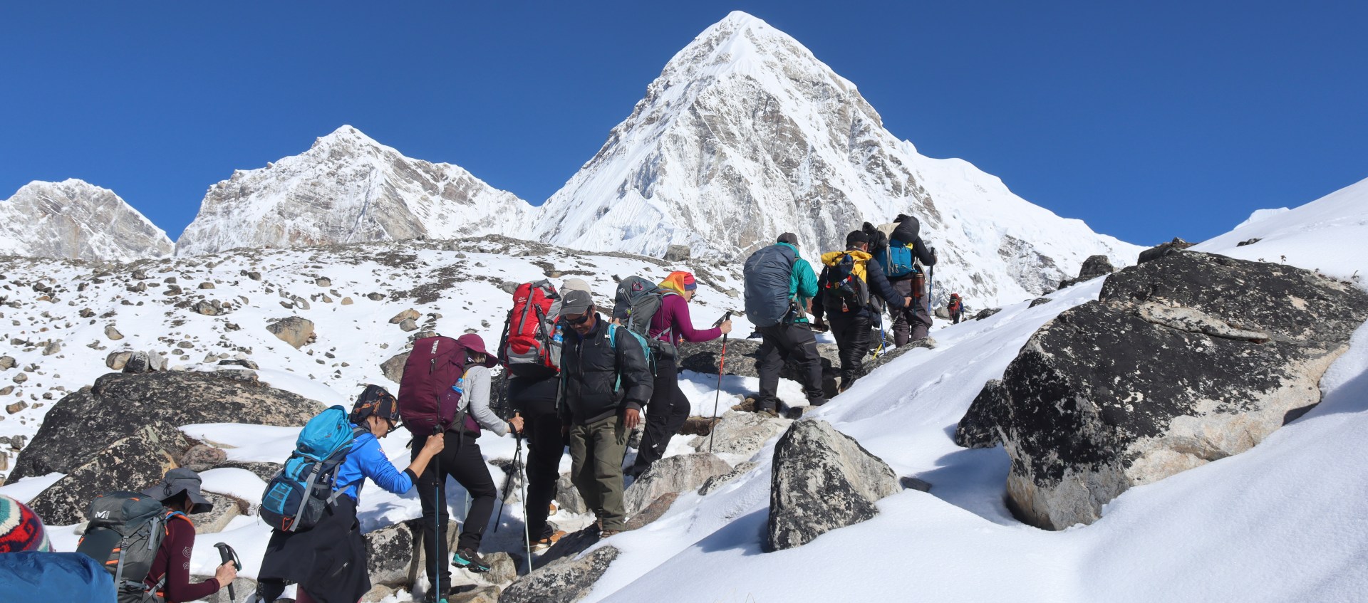 Climber training on stairs with a weighted backpack to build cardiovascular endurance