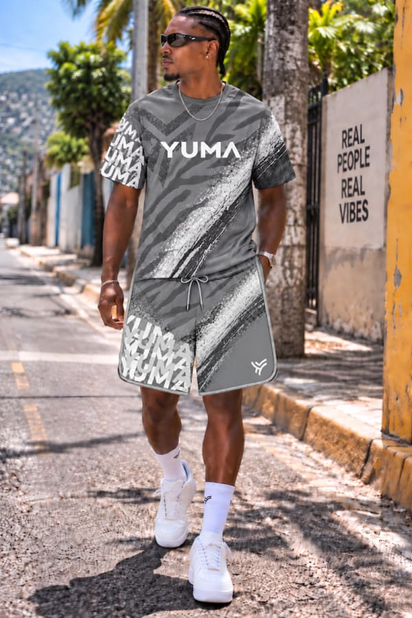Man wearing Yuma Riidung grey zebra print t-shirt and shorts for Trinidad Carnival 2027