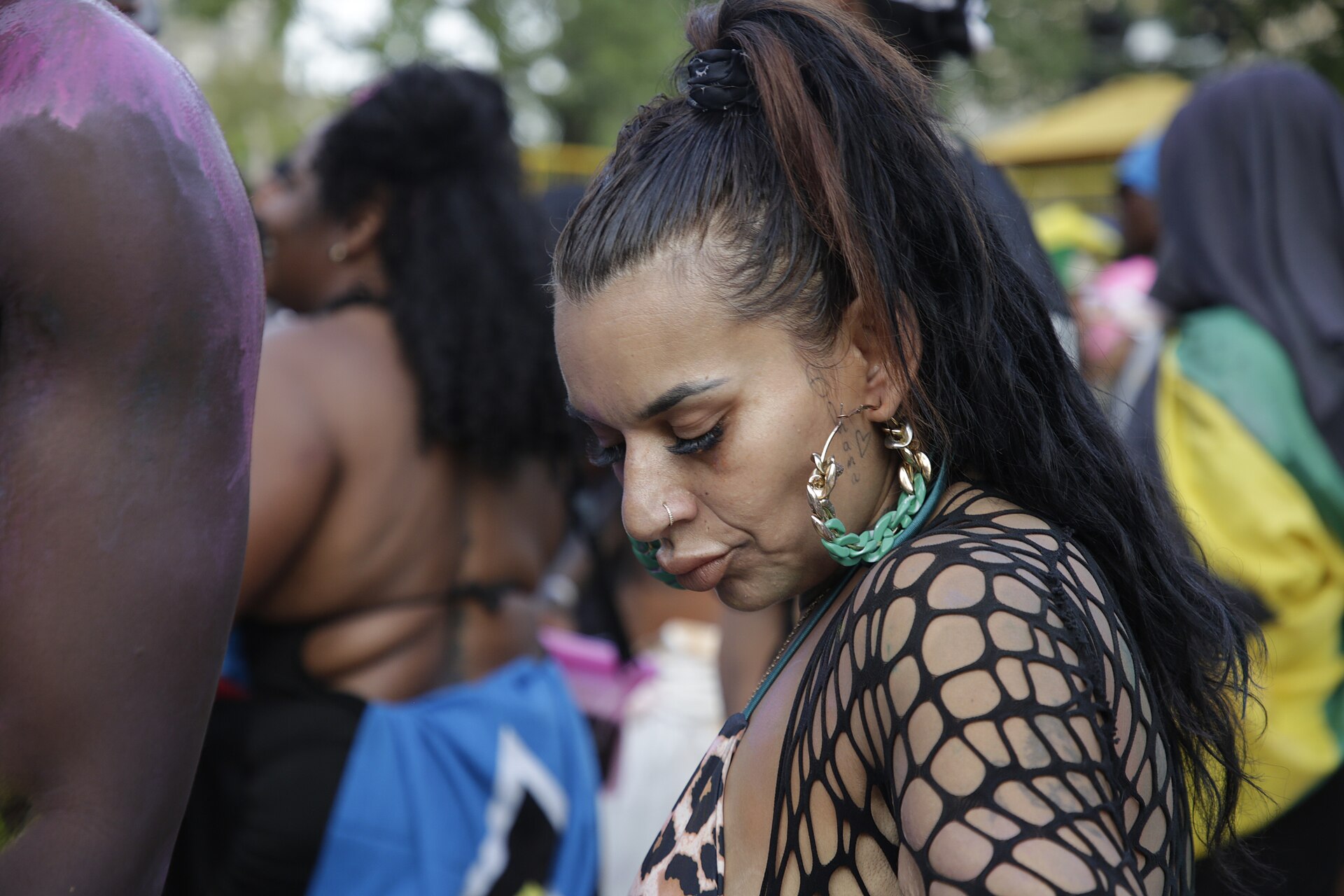 J'ouvert masqueraders in paint and powder