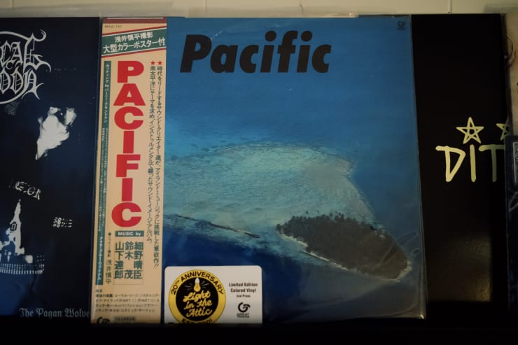 record titled Pacific on shelf surrounded by other records halfway in the frame