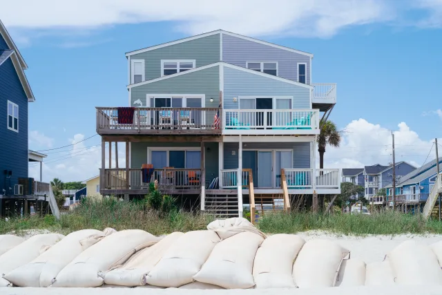 a duplex beach house with both sides almost mirroring each other